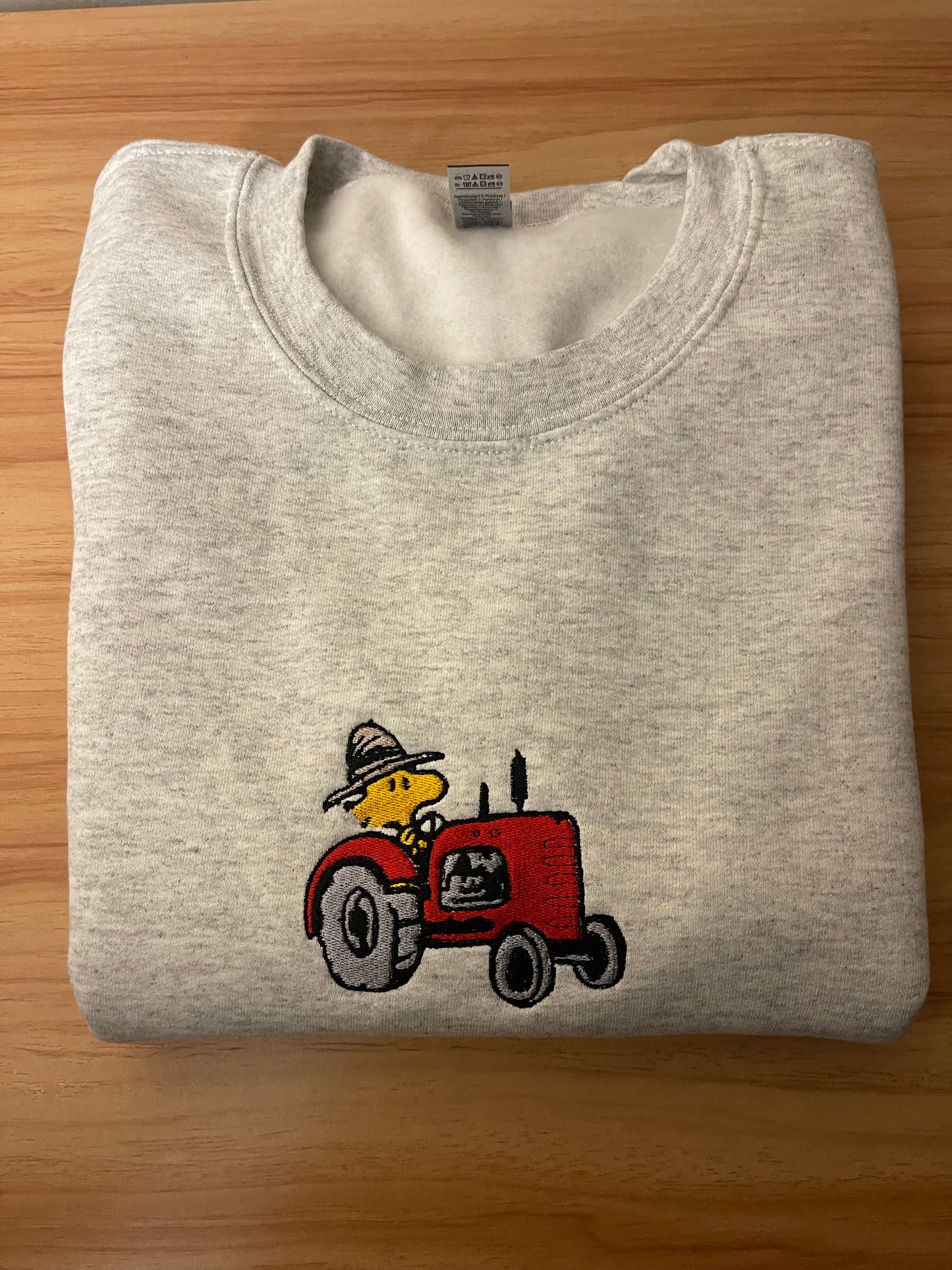 Woodstock on Tractor Embroidered Sweater