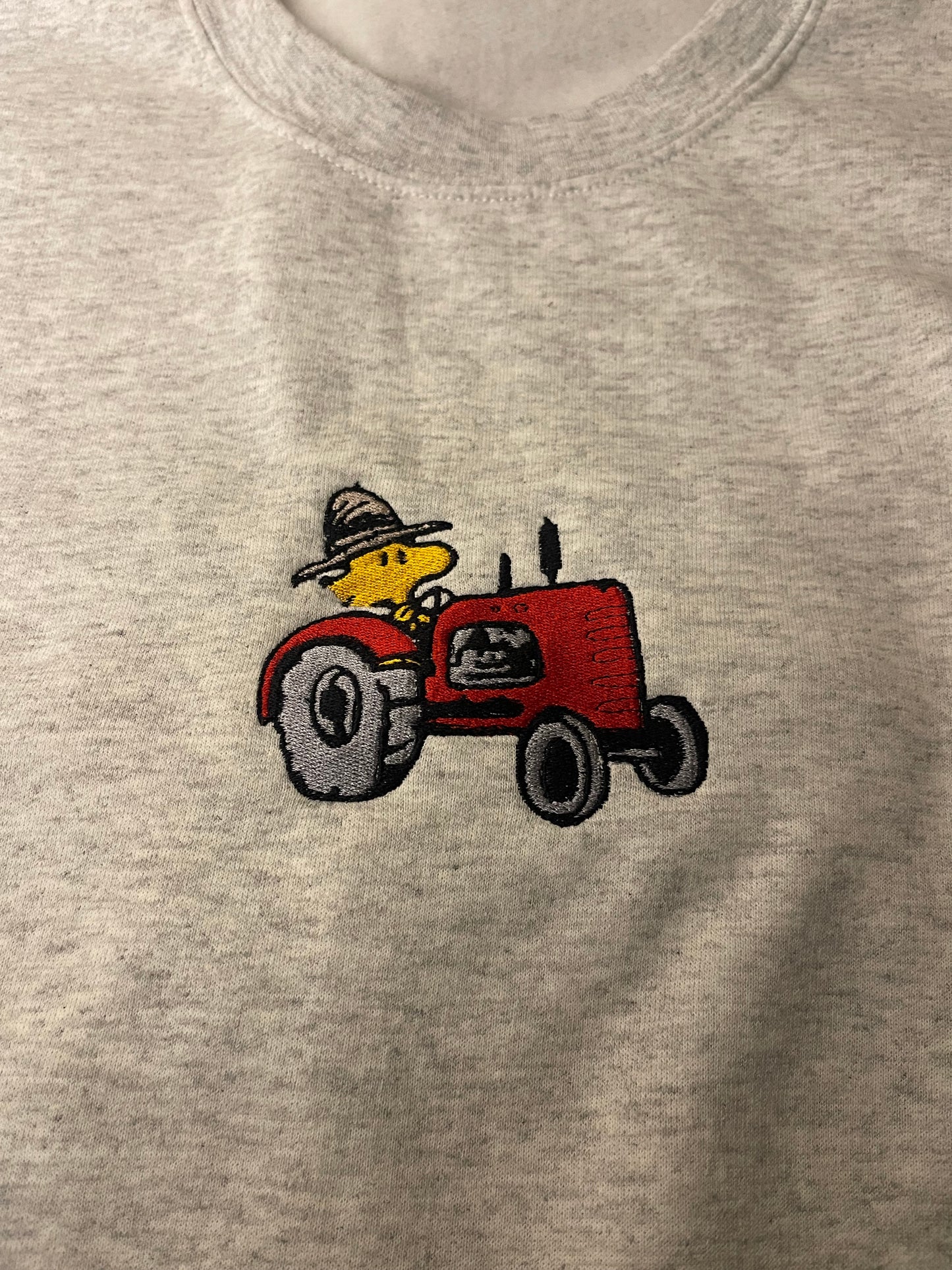 Woodstock on Tractor Embroidered Sweater